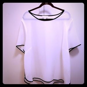 White short sleeve blouse trimmed in black